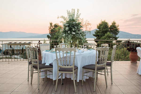 elegant-summer-wedding-palairos-white-roses-lycianthus-olive-leaves_19x