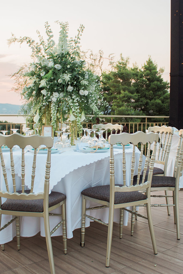 elegant-summer-wedding-palairos-white-roses-lycianthus-olive-leaves_22