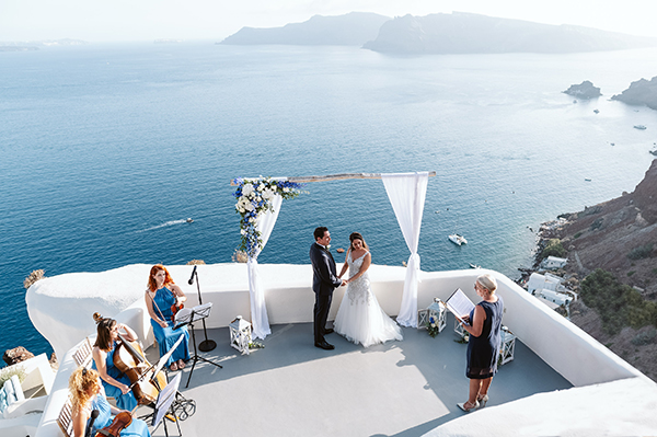 romantic-wedding-santorini-island-impressive-white-blue-florals_17