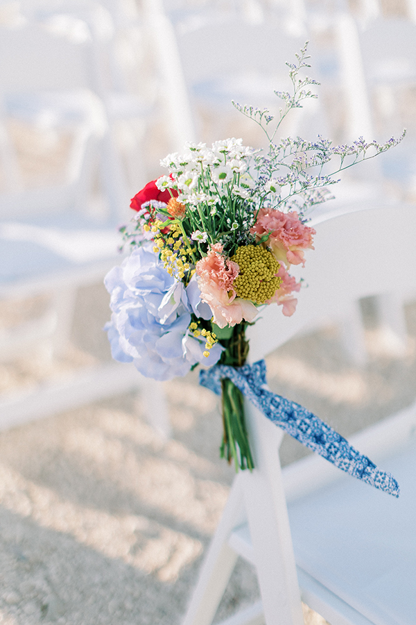 stylish-summer-wedding-nava-seaside-colorful-florals_28