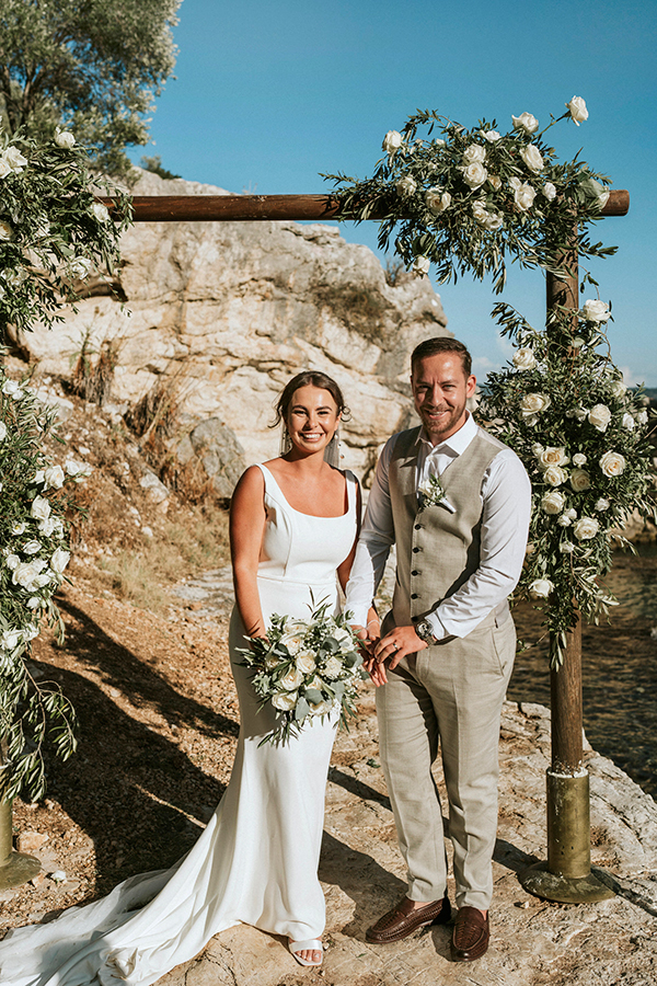 outdoor-summer-wedding-corfu-white-blooms-lush-olive-leaves_26