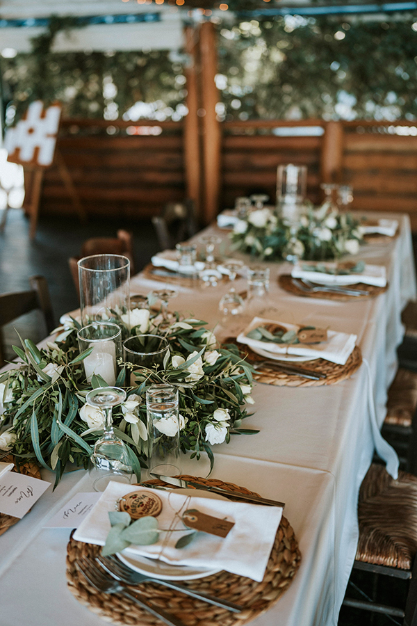 outdoor-summer-wedding-corfu-white-blooms-lush-olive-leaves_33