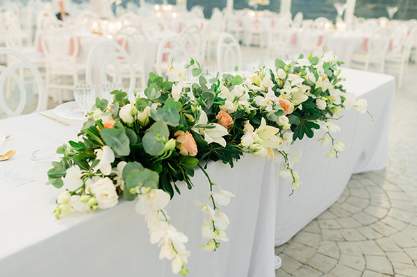 summer-wedding-nicosia-beautiful-florals-orchids-roses-white-coral-hues_43